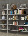 Modern three-bay modular shelving unit for stylish storage and organization.